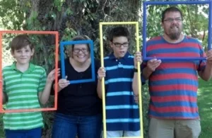 A group of people posing for the camera