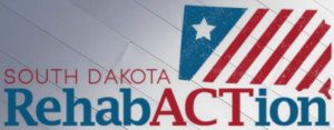 South Dakota Rehab Action logo with a stylized flag icon and blue and red text.
